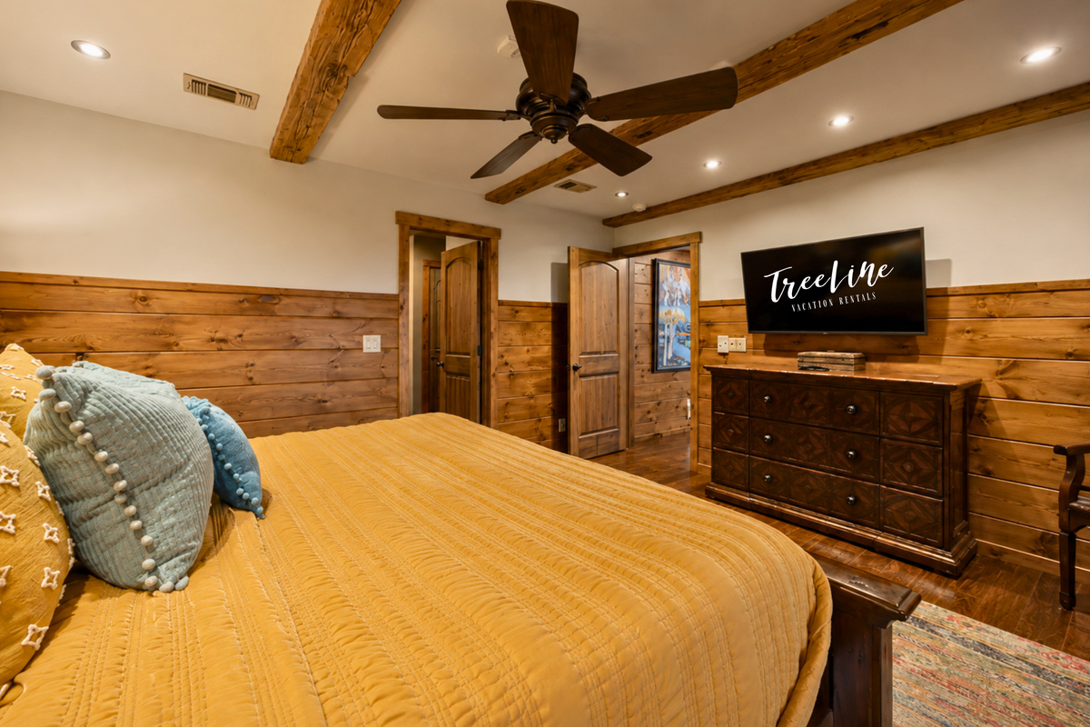 From this angle, you can really appreciate the comfortable king bed, spacious layout, and thoughtful furnishings that make this room feel relaxed and welcoming.