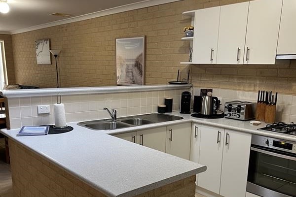 Lovely modern kitchen with coffee pod machine & underbench microwave