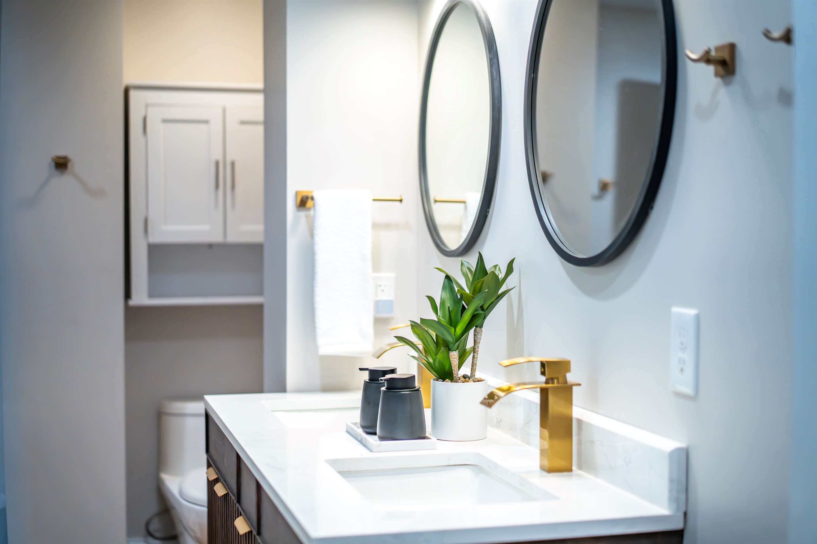 A calming glow, warm brushed gold touches, and soft textures invite you to linger—this serene spa-like haven is your personal exhale between adventures