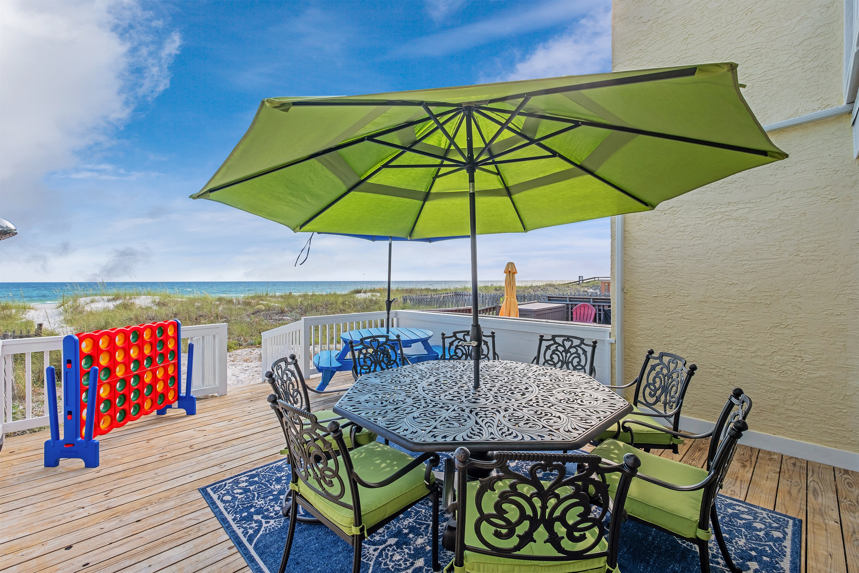 Our deck isn't just for relaxation; it's also a place for fun! Engage in a game of Connect Four while soaking in the sun and enjoying the beach atmosphere.