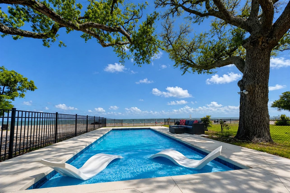 Enjoy sunny swims with the beach just steps away.
