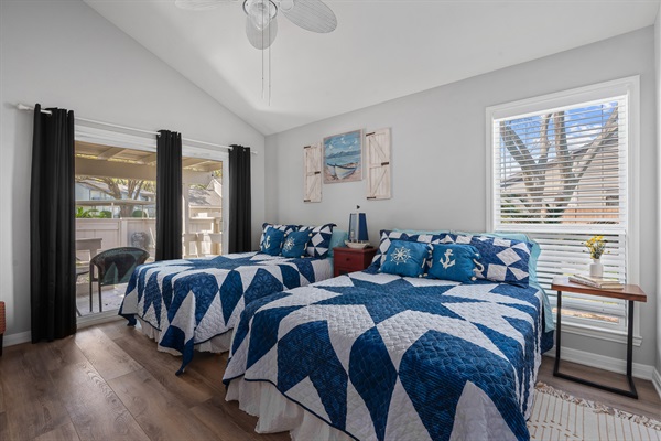 Wake up to soft natural light and plenty of space in this bright, beachy guest room—ideal for morning coffee by the window or winding down with a book. 