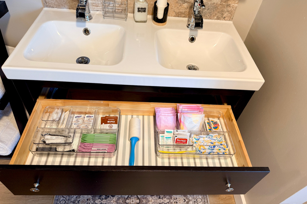 Spacious bathroom vanity with room for guests’ personal items.