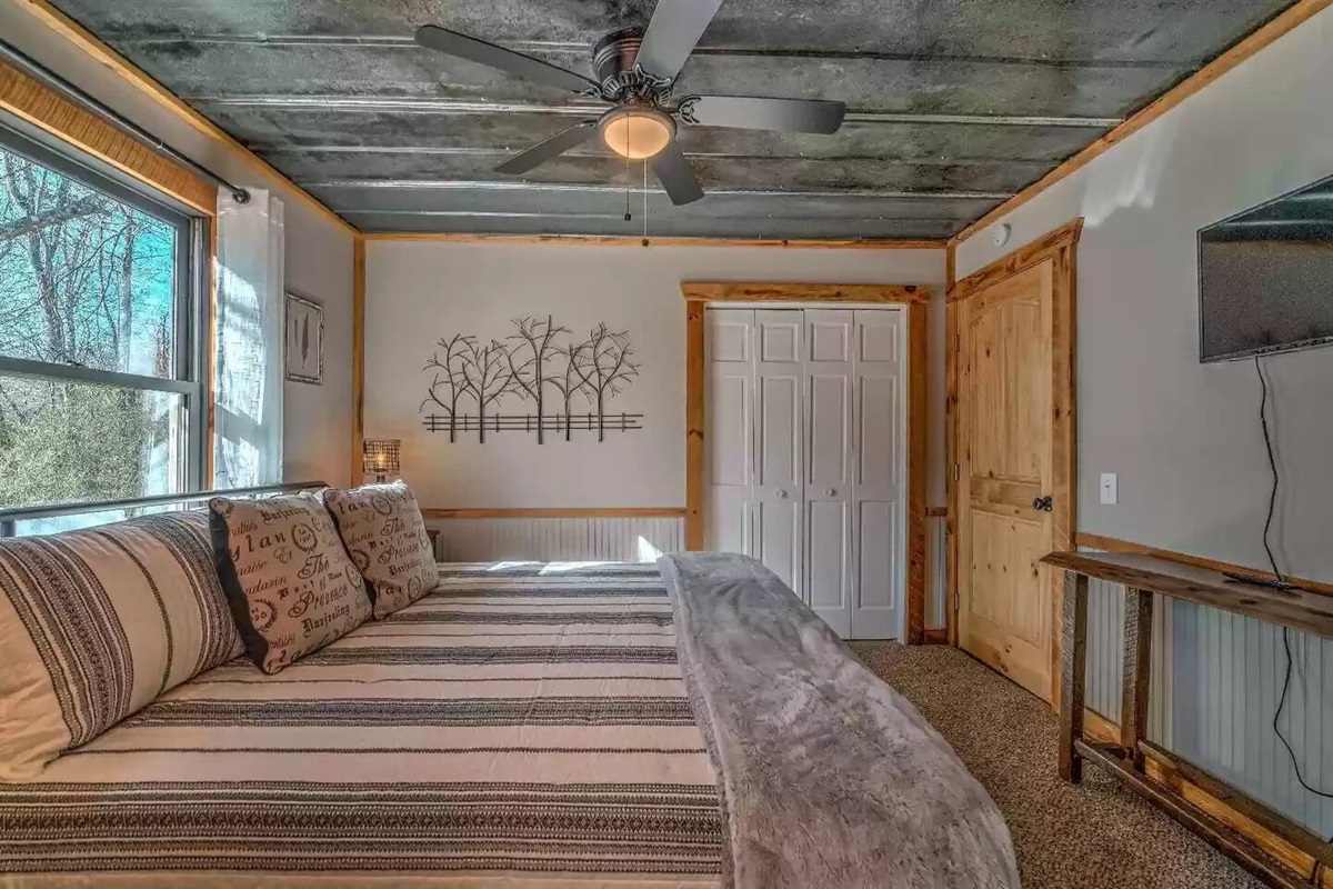 Master Bedroom with en suite bath and views of the creek from the window.