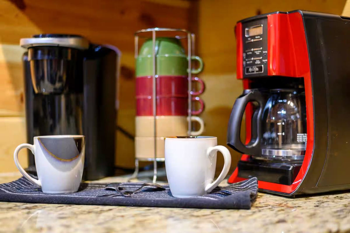 Coffee Nook: Sip your morning brew in style with modern machines and charming mugs!