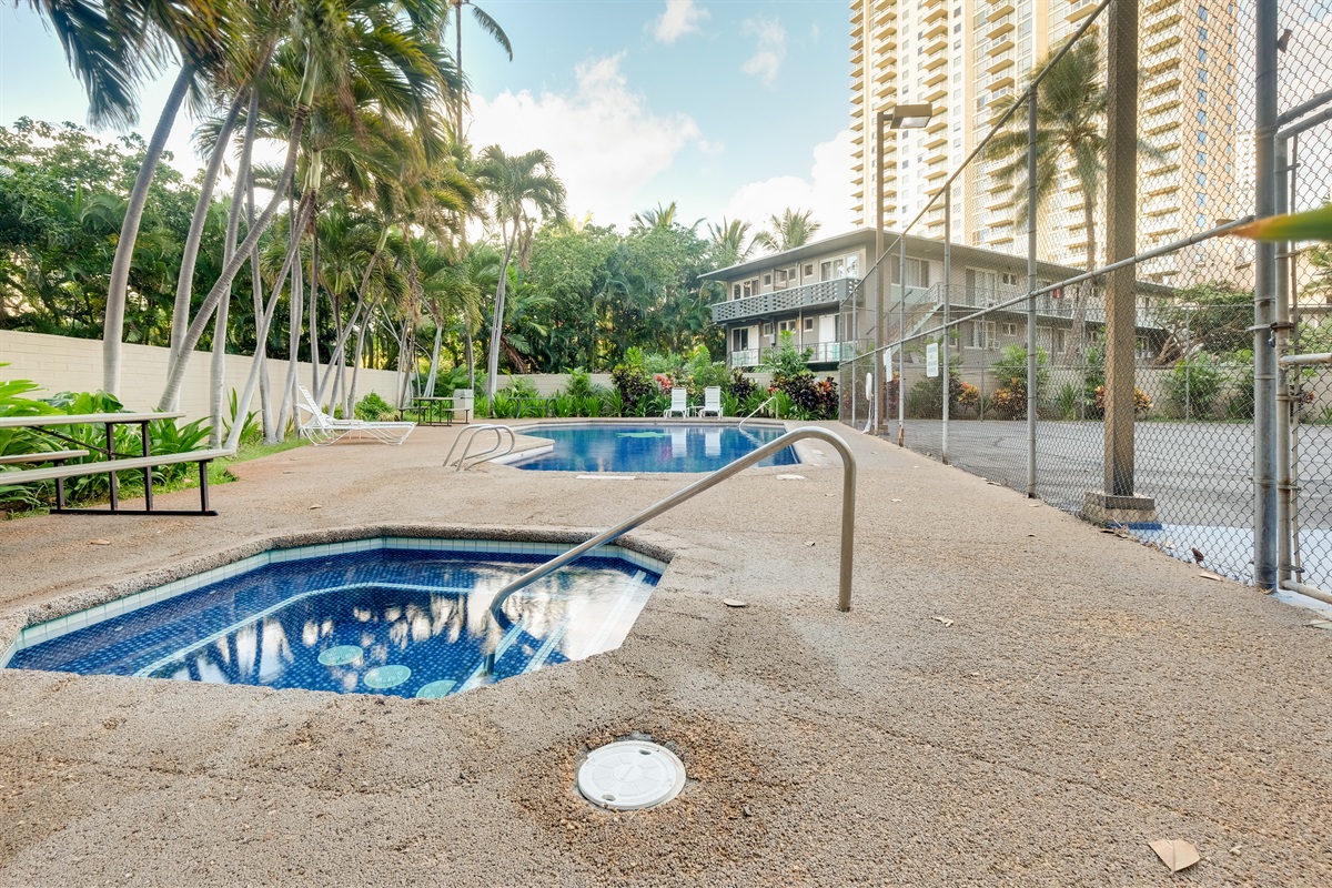 Unwind in paradise with a soothing soak in the hot tub or a refreshing swim in the pool, surrounded by swaying palms and island serenity. The perfect way to relax after a day exploring Waikīkī.