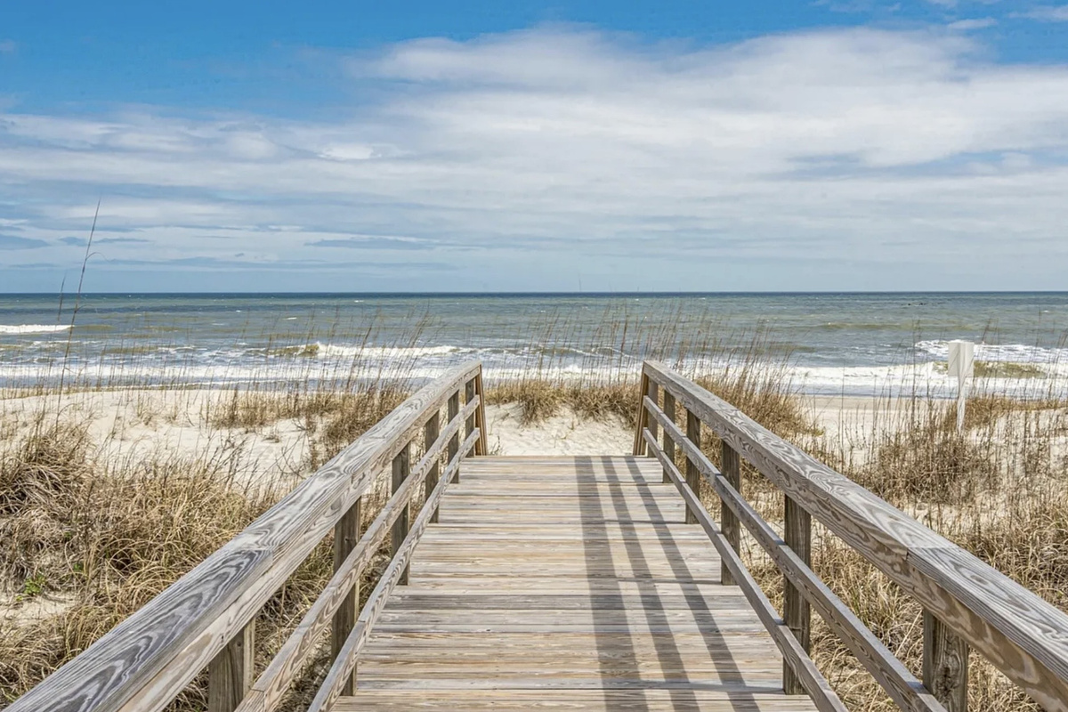 The boardwalk to the beach is just a short walk, no driving or parking needed. ⭐
