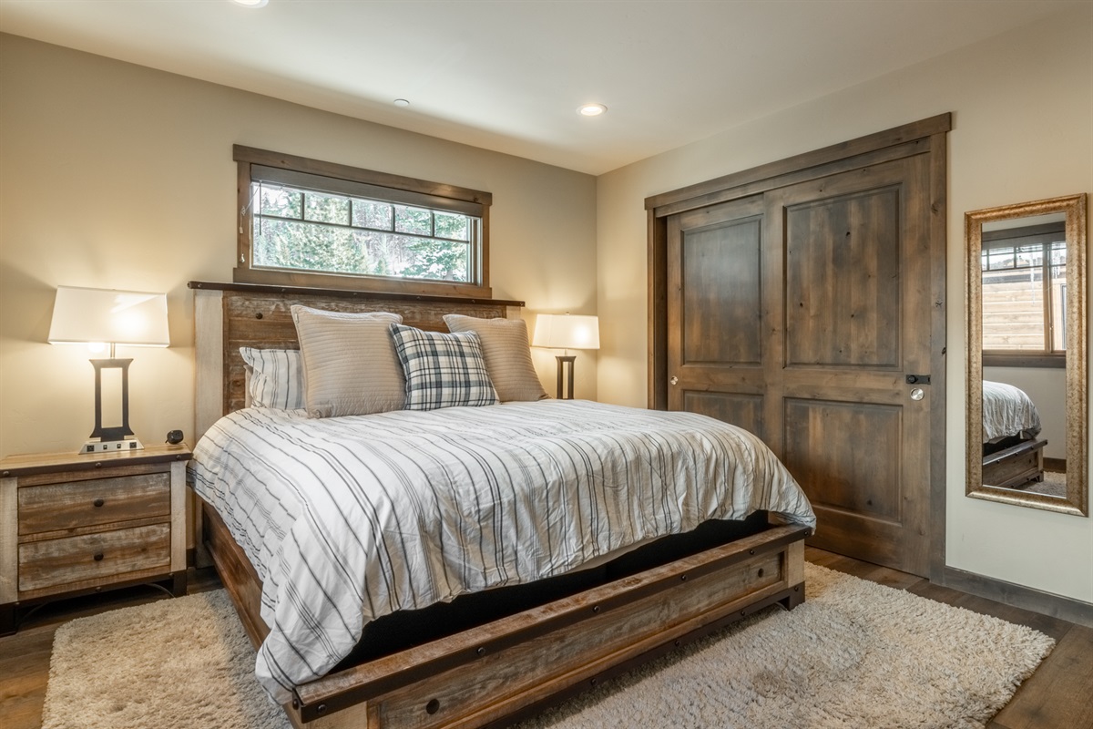 With an attached bath and generous space, this second primary suite is ideal for couples traveling together.