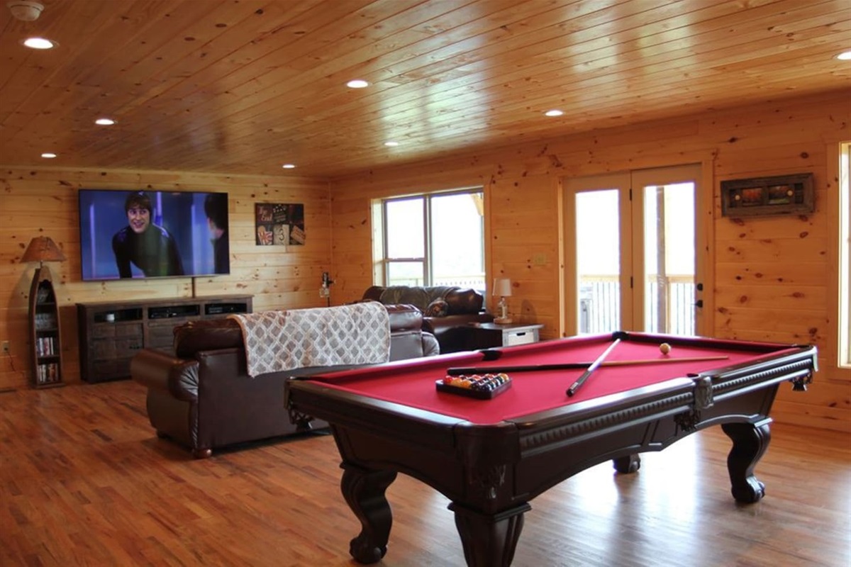 Game Room with pool table, arcade game, Xbox and 82" Smart TV