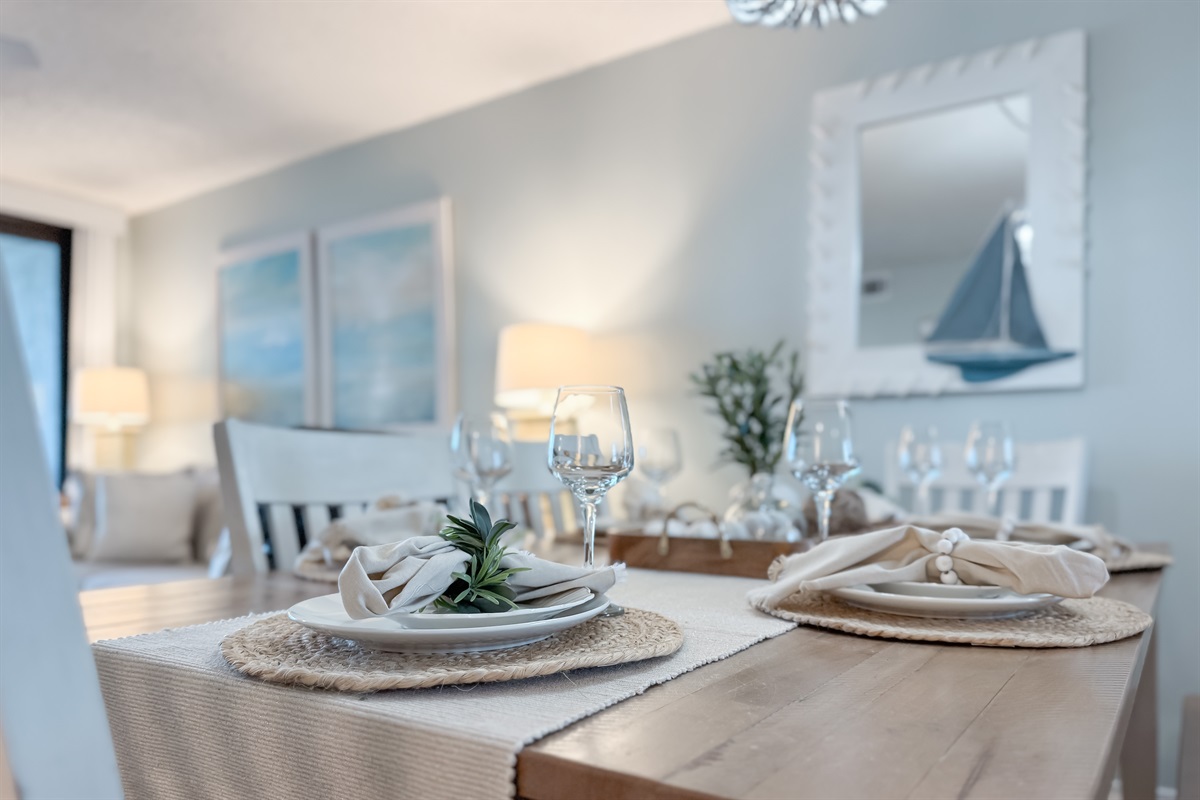 Coastal elegance meets relaxed dining in this inviting space.