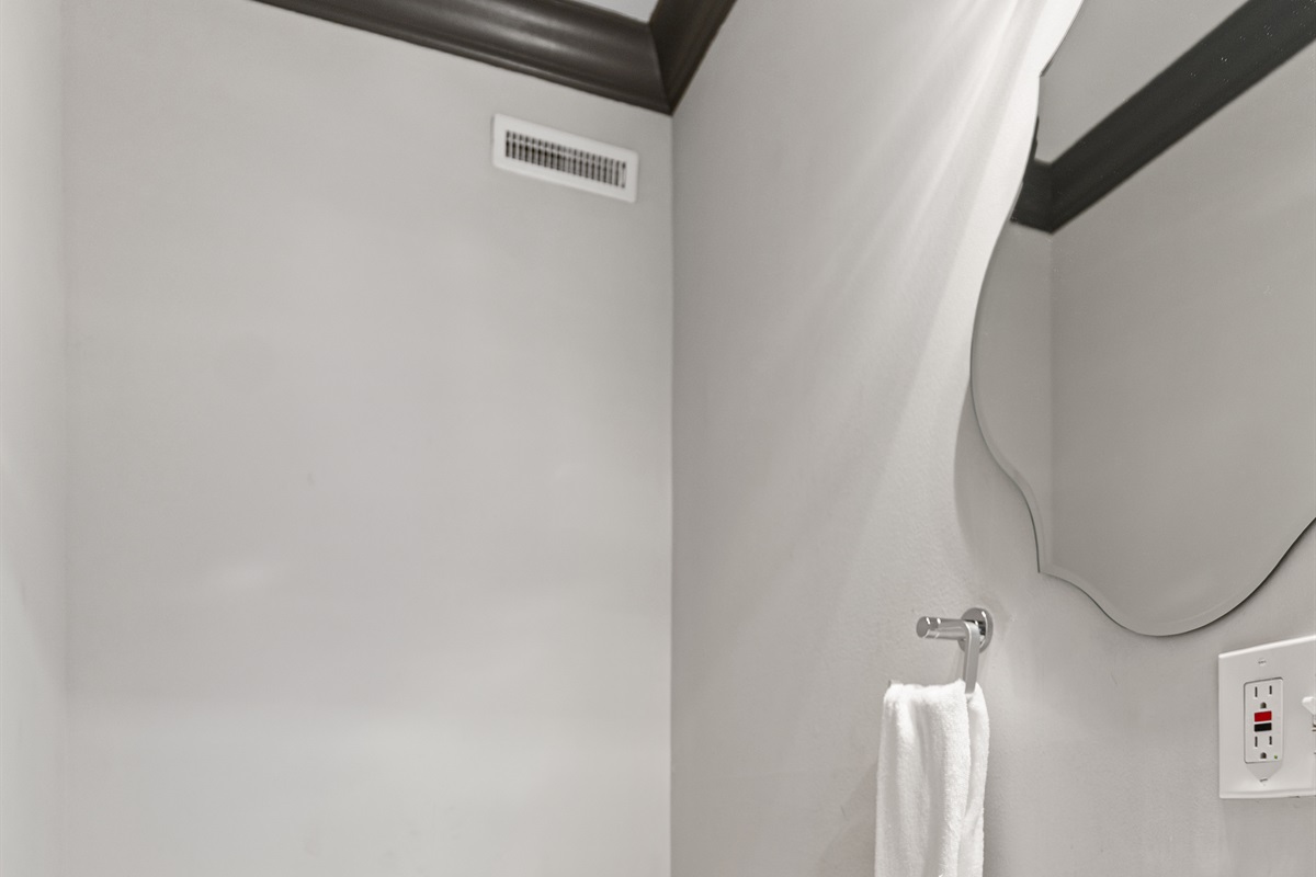 Convenient main-level half bath located just off the gathering spaces.