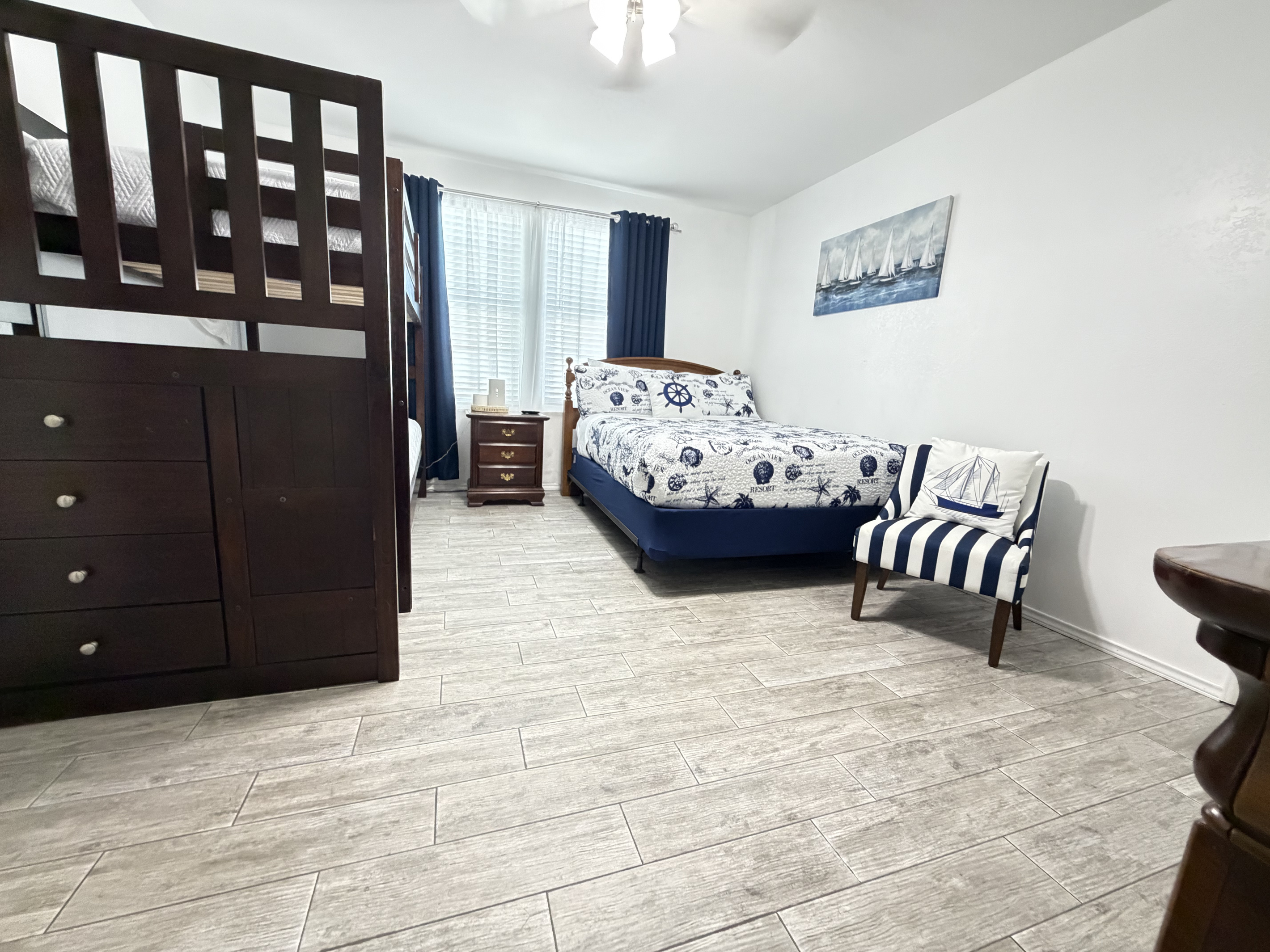 Room darkening curtains make it easy to unwind after a day at the beach or for afternoon naps.