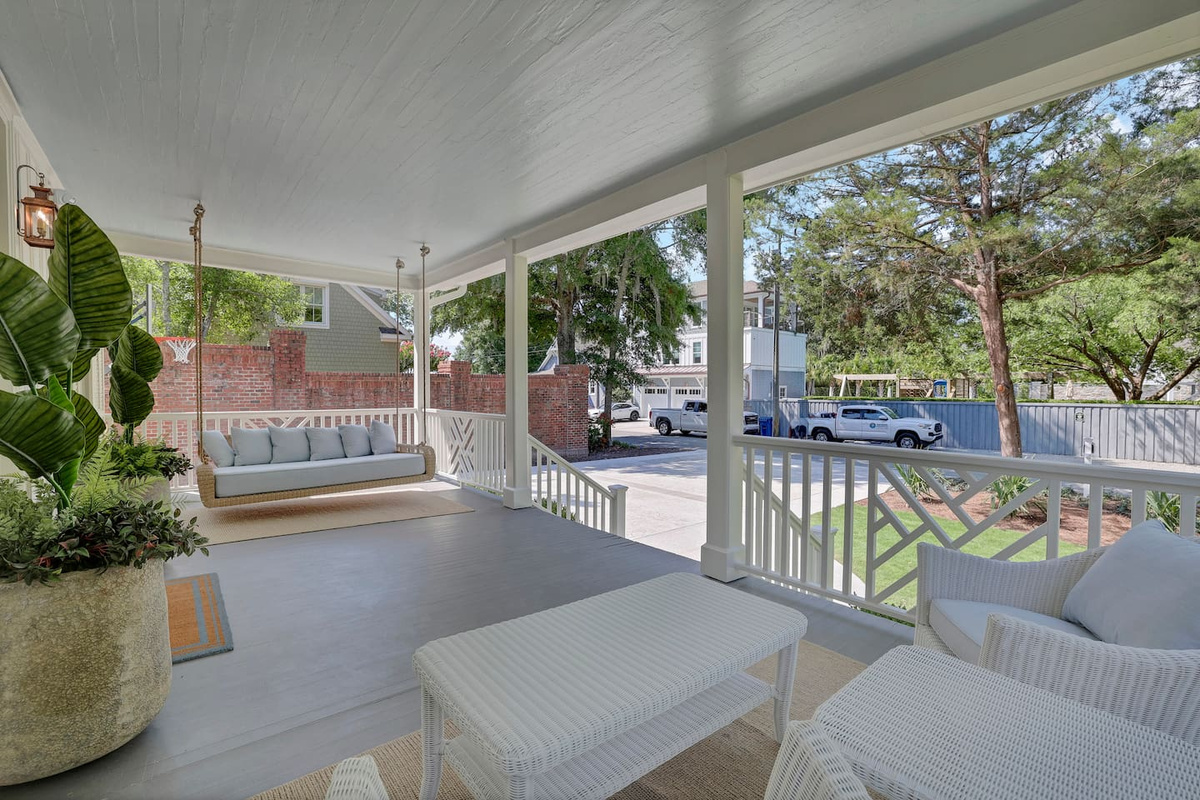 Welcoming, spacious, shady covered front porch!
