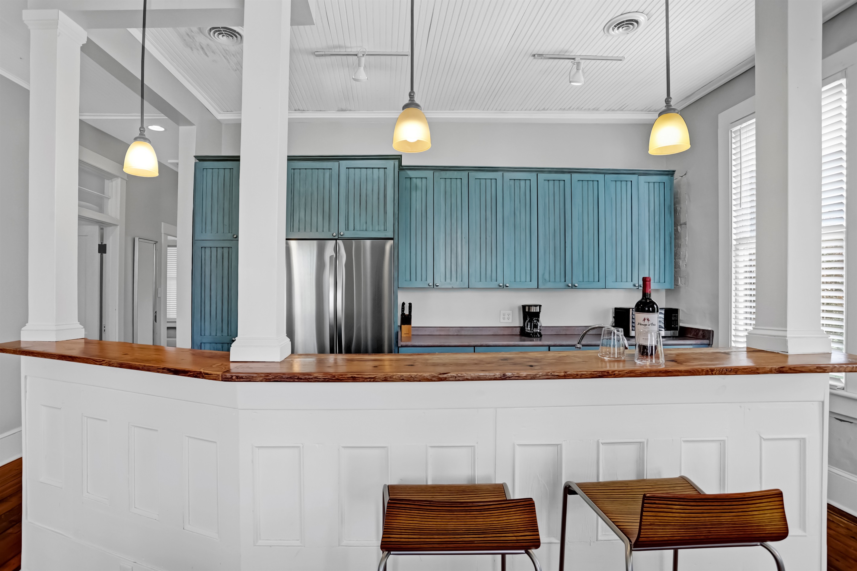 With two barstools and a spacious island, it's the perfect spot for casual bites and morning chats.