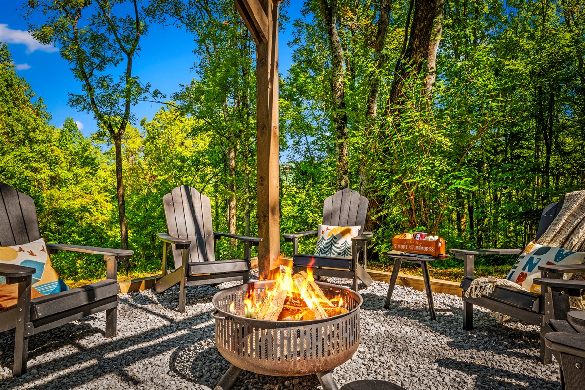 🔥 Crackling fire, comfy chairs, and a forest soundtrack. This is where ghost stories and stargazing begin.