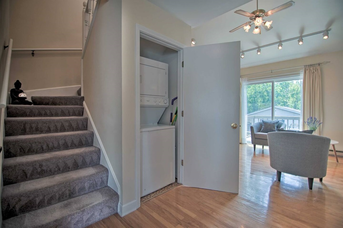 The stackable washer and dryer is conveniently located on the first floor for doing laundry during your visit or before you return home. 