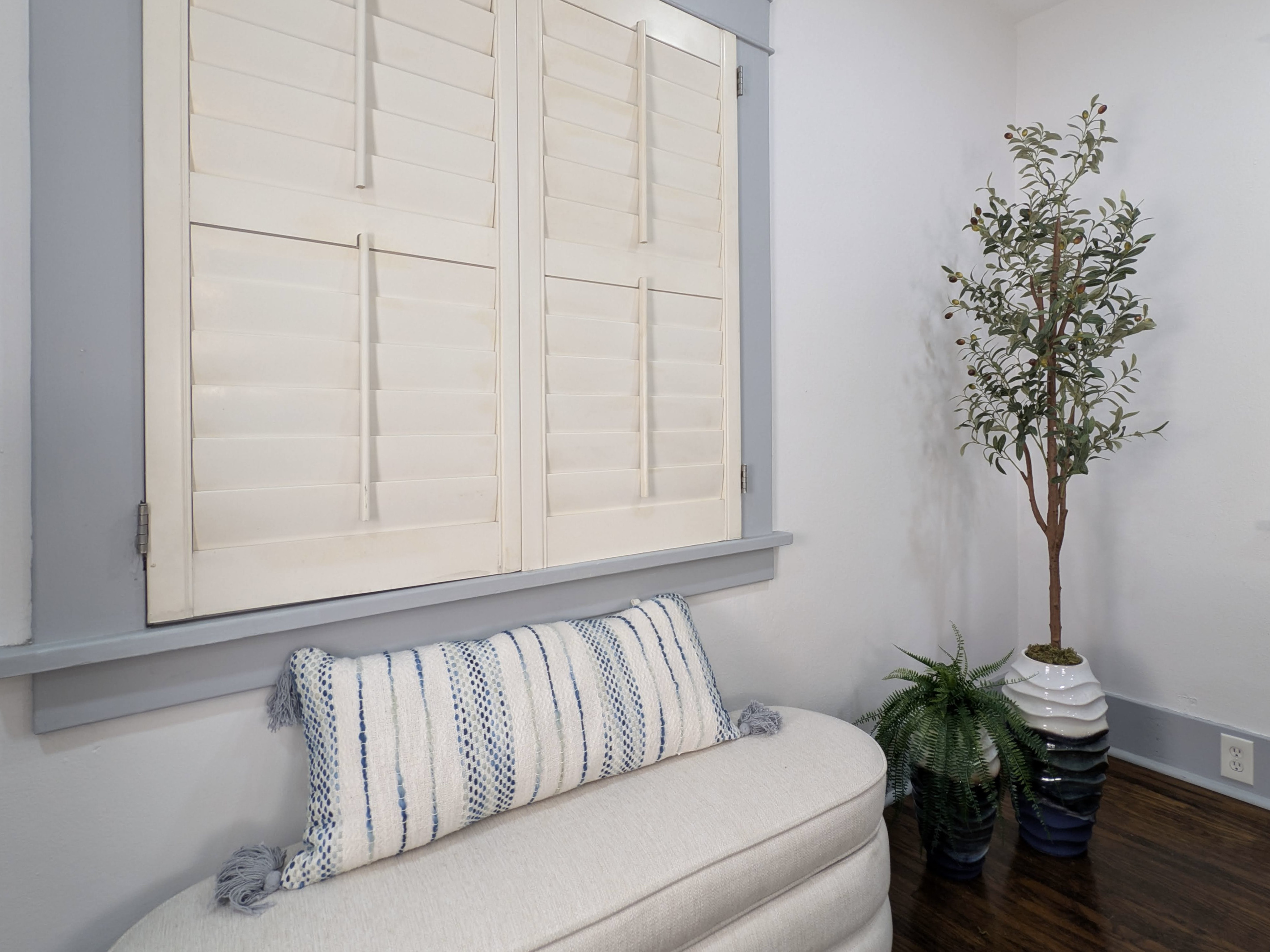 Take a moment to slow down. This cozy nook is the perfect place to enjoy your morning coffee, read a book, or simply relax.