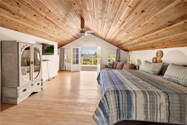 Master suite opens to the top deck and views of the sunrise and the mainland