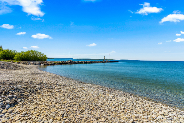 shore stone beach across from 'relaxincolour' for swimming, paddle boarding, kayaking, with 