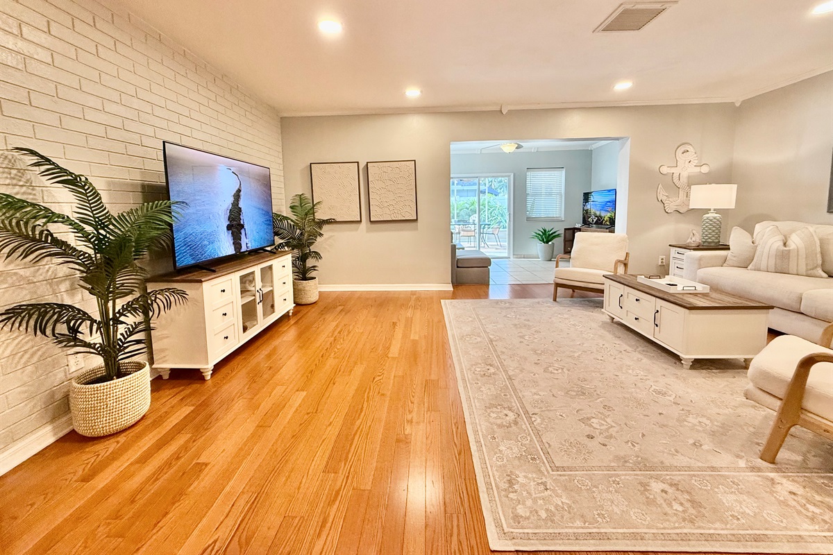 Designed with comfort in mind, this living room includes plenty of seating for the whole crew to gather, relax, and reconnect.