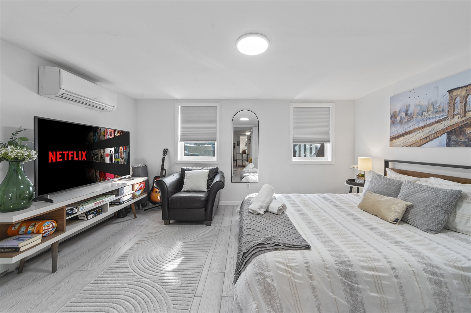 Wake up slowly in a bright, peaceful bedroom that makes restful sleep feel effortless after full days in the city.