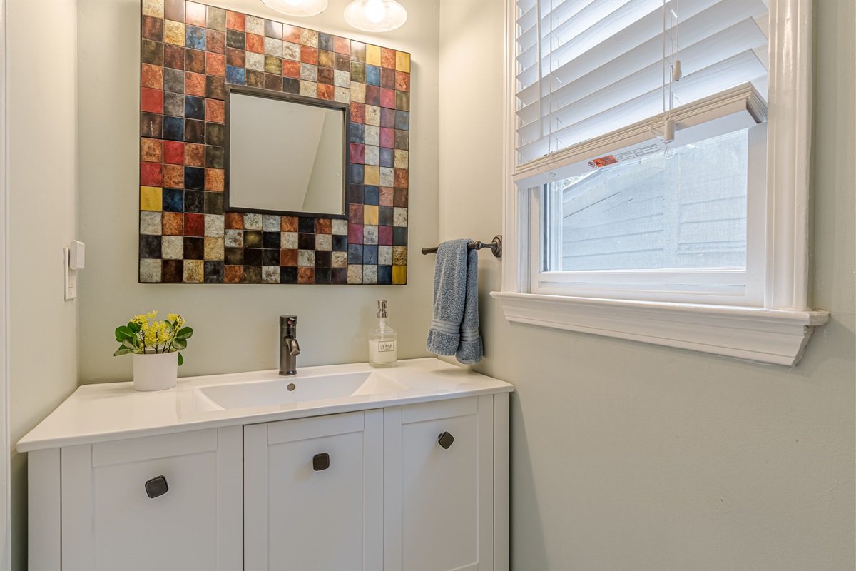 Bright and functional powder room with unique décor touches.