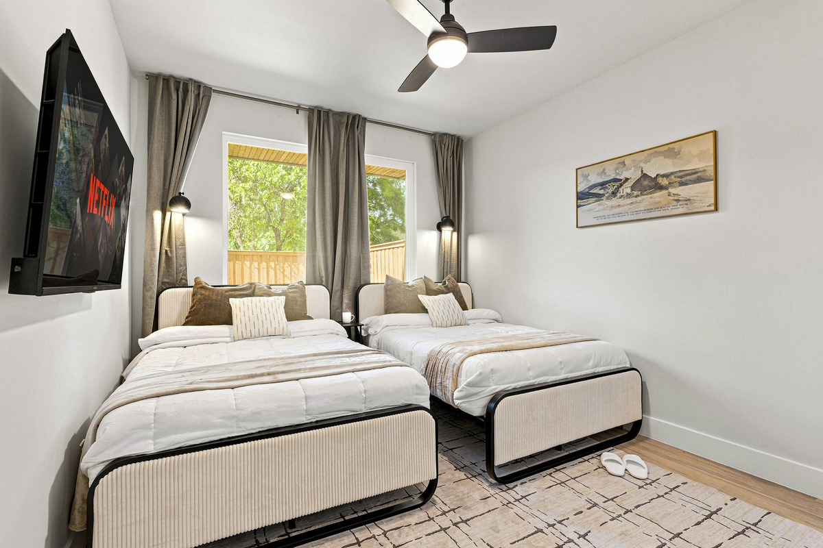 Bright and modern with plush bedding, perfect for relaxation and entertainment!
