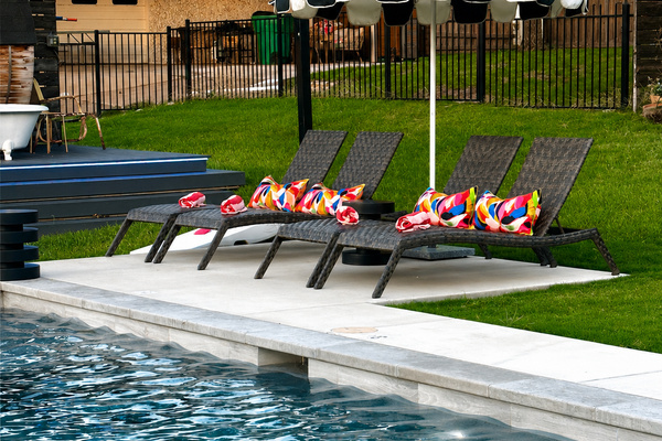 Poolside loungers ready. Towels included.