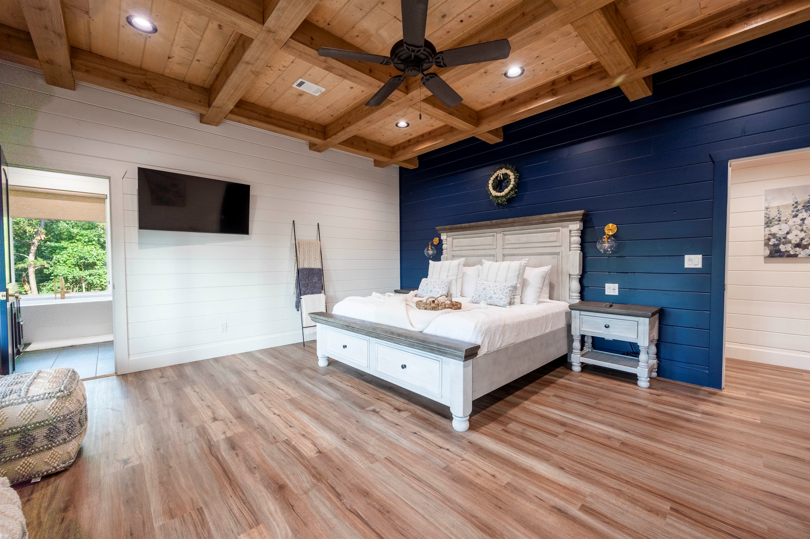 Stylish master suite with rustic elegance and inviting natural tones