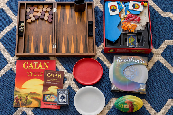 Game collection including classic board games and family-friendly entertainment for guests of all ages.