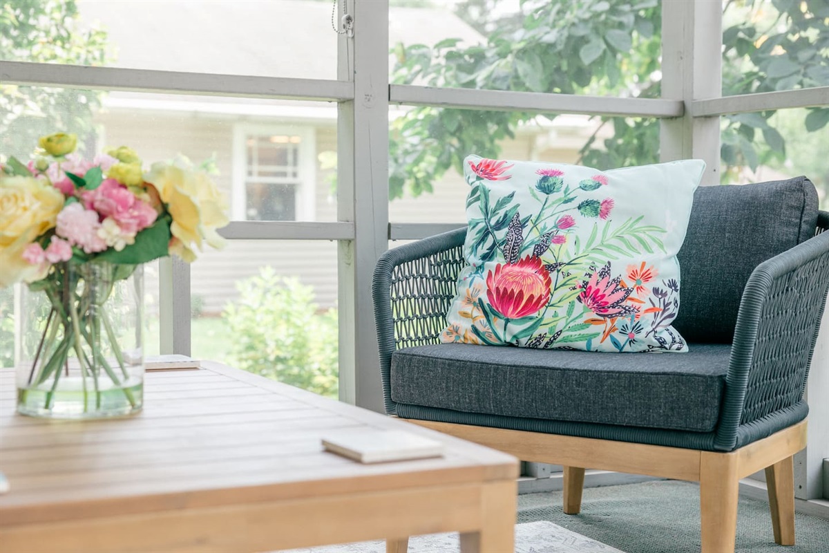 Screened-in porch overlooks a beautifully landscaped yard. Surrounded by wonderful, friendly neighbors. 