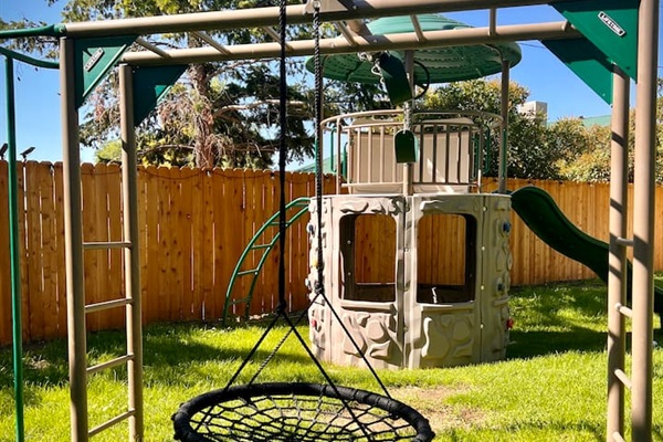 Enjoy watching the children play in the yard as you relax on the front patios.