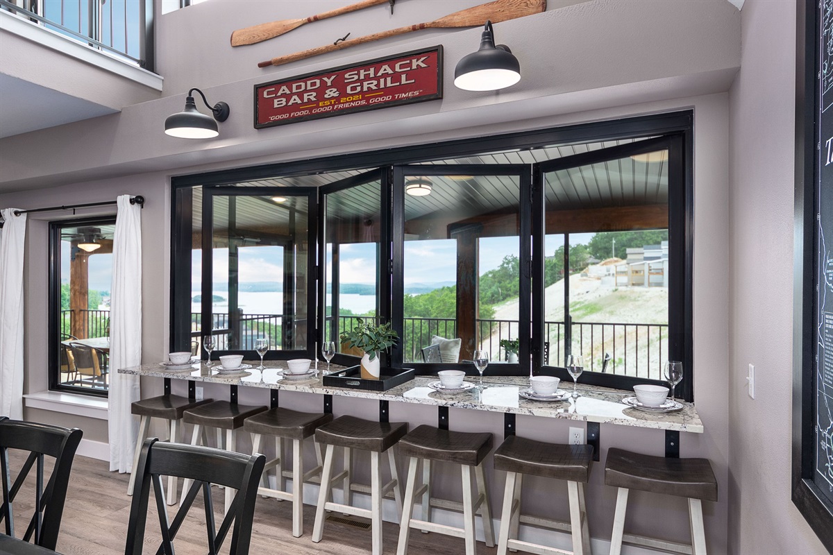 Folding window opens to screened in deck.  Take in those views!
