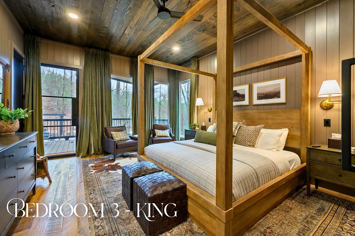 This spacious king suite brings in cozy textures, tall windows, and a welcoming place to unwind for the night.