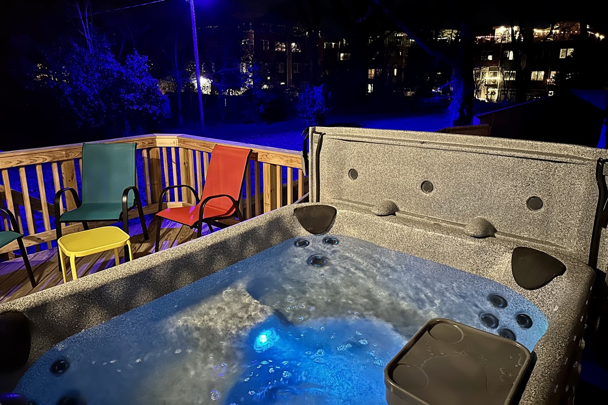 Enjoy the city lights while you soak in the warm hot tub.