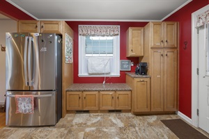 Kitchen stocked with 3 door refrigerator