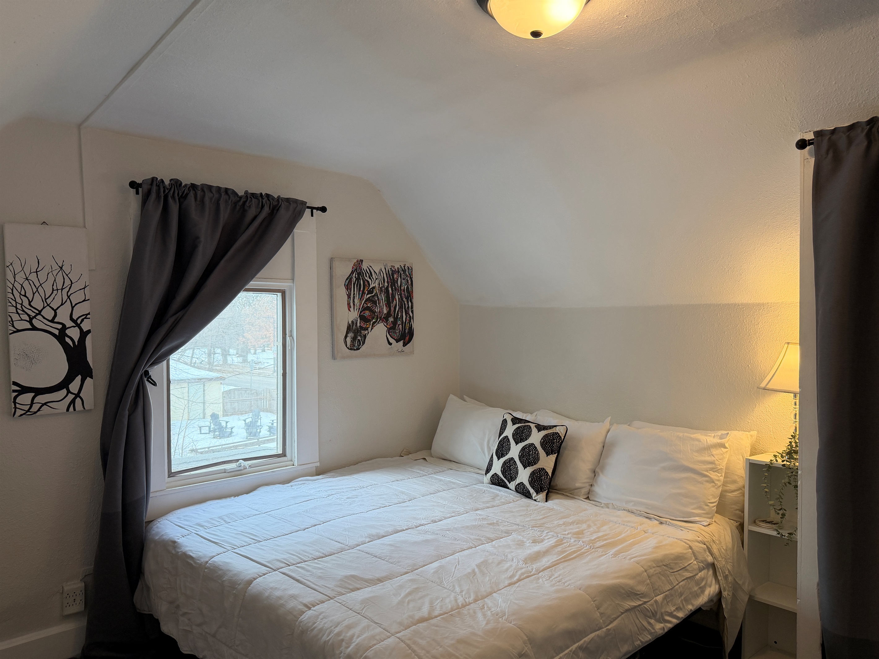 Enjoy the comfortable king bed and backyard views.