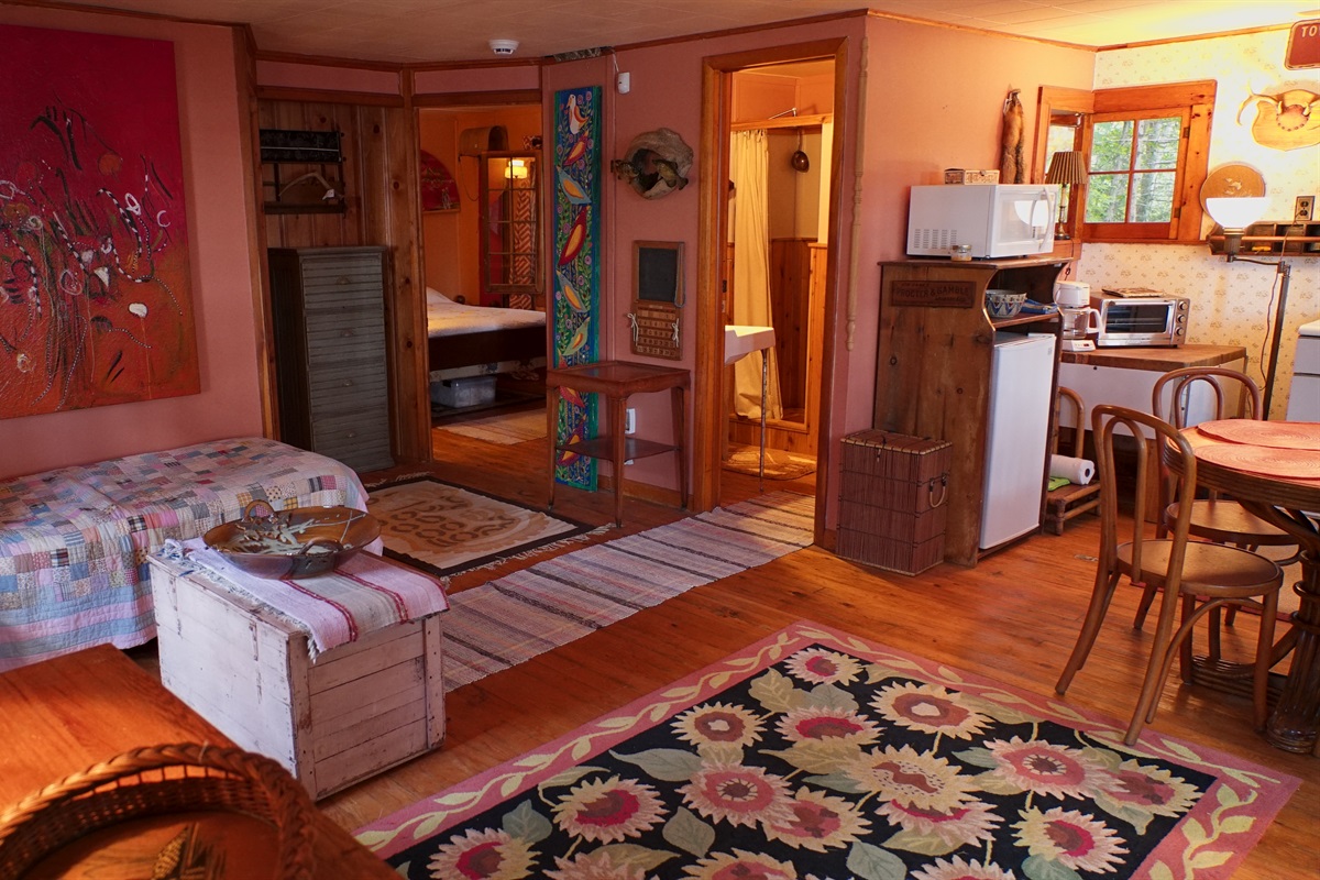 Cottage has open living area and dining table
