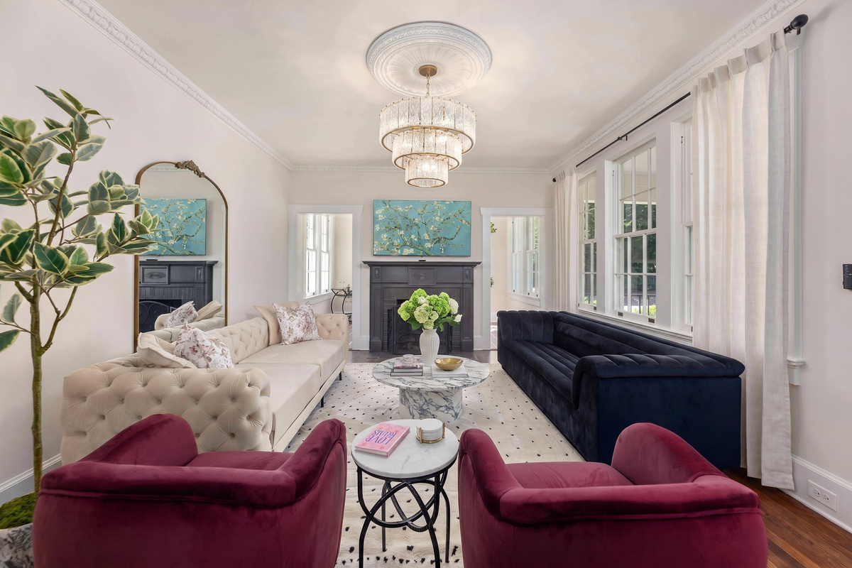 Enjoy this light and airy living room with comfortable plush velvet seating.