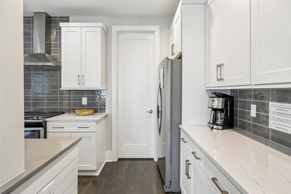 Cook for the whole group without feeling cramped &mdash; island with sink, full-size appliances, and enough counter space to actually prep a real meal.