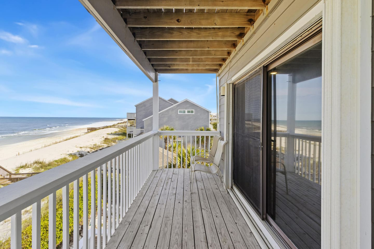 Your private Gulf- front deck off the guest room &mdash; morning coffee here should be written into the schedule.