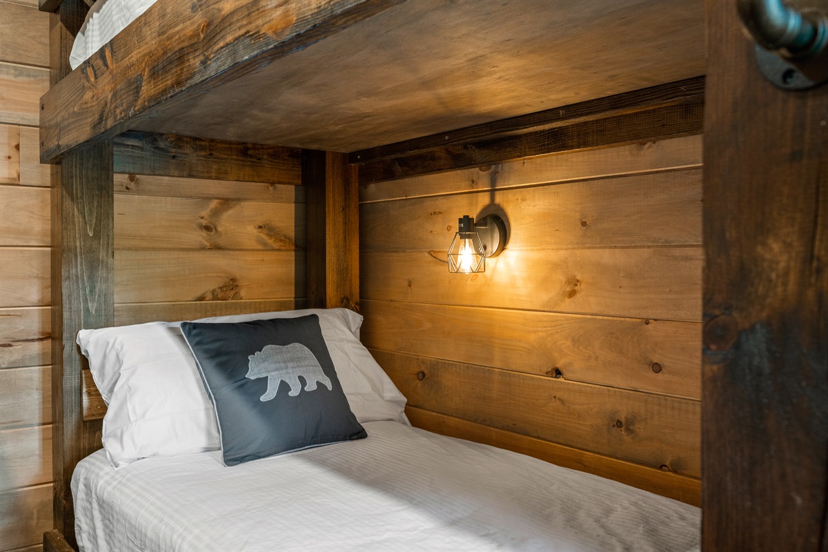 Each bed in our bunk room has its own reading light