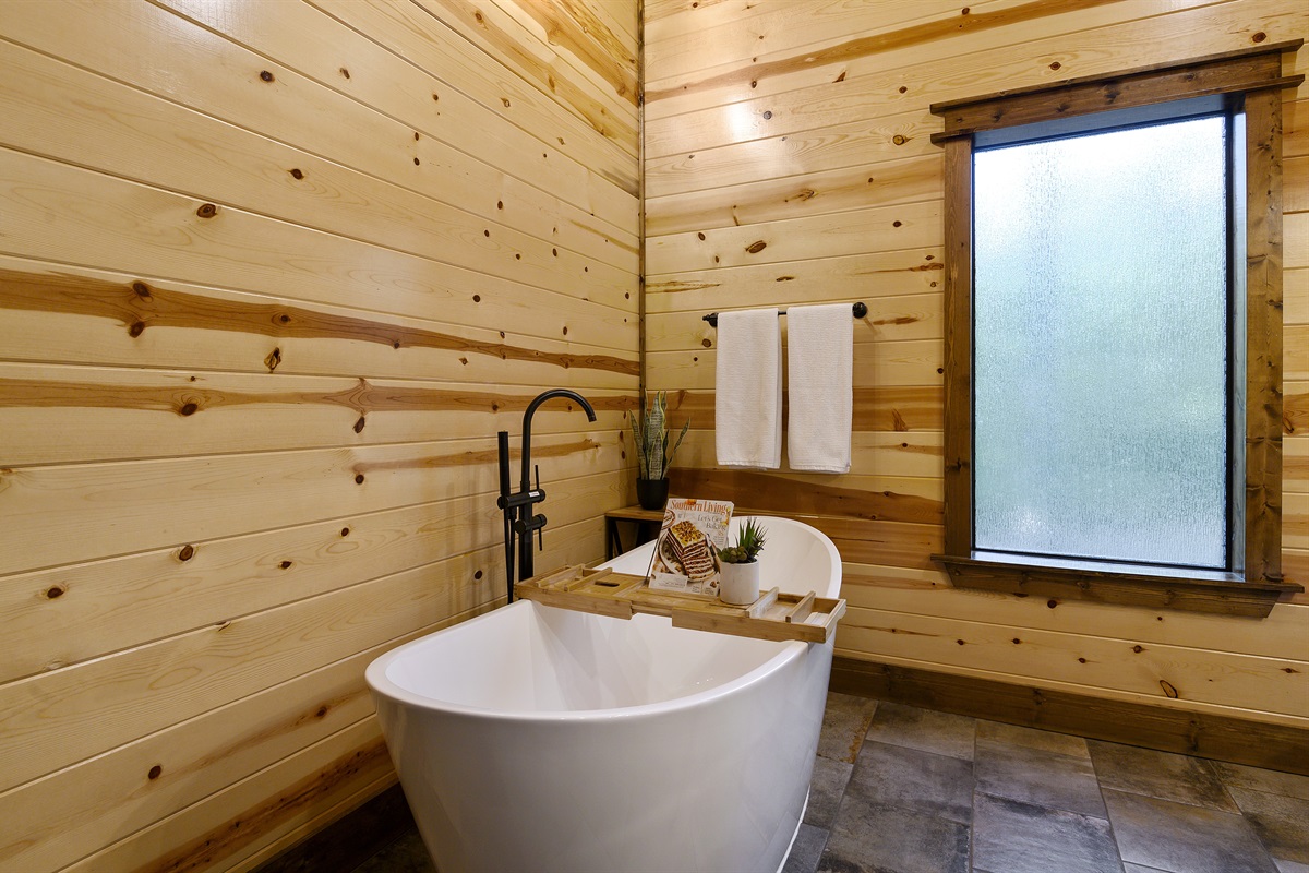 Soak away your worries in the oversized tub with a shower wand.