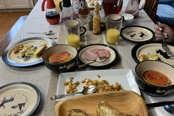 Alaska-style breakfast served around the shared table