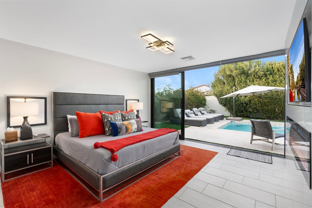 Contemporary artwork, a geometric headboard, and clean lines create a calming space ideal for unwinding after a day of desert adventures.

