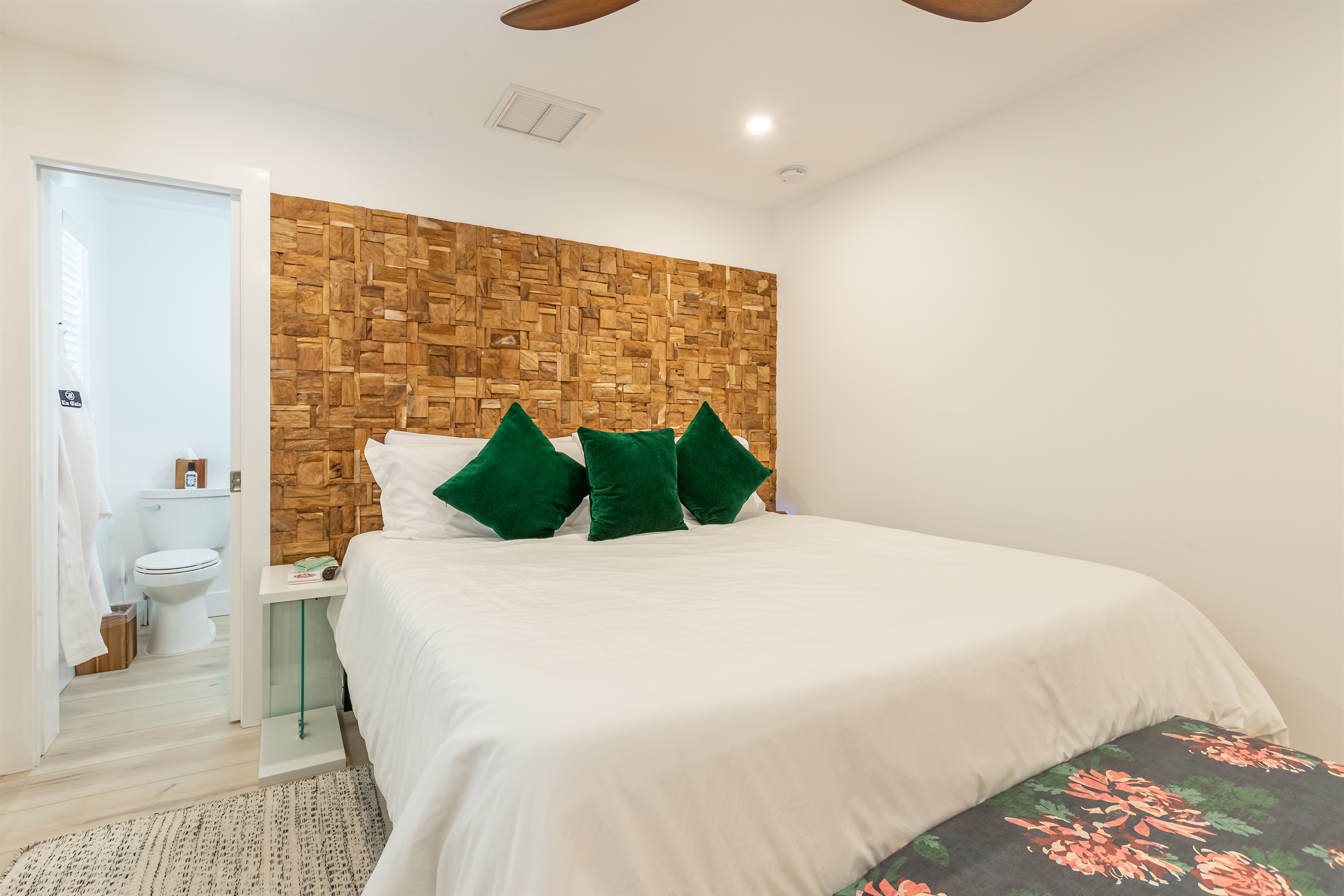 Master Bedroom: Relax in style with lush greenery and vibrant decor, just steps from paradise!