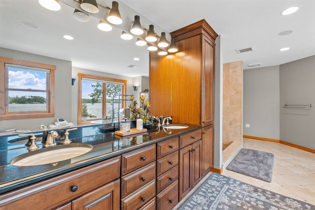 Second floor master bathroom with Lake Winnipesaukee views soaking, tub and walk in shower
