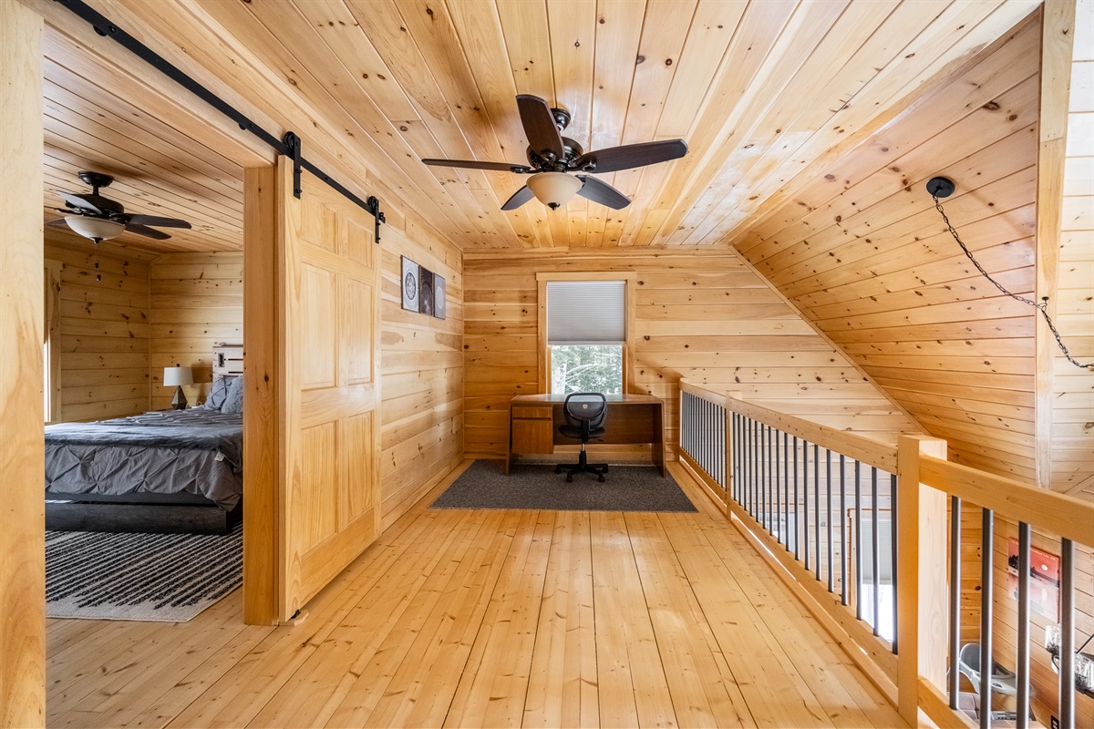 2nd floor working space with desk and ergonomic chair