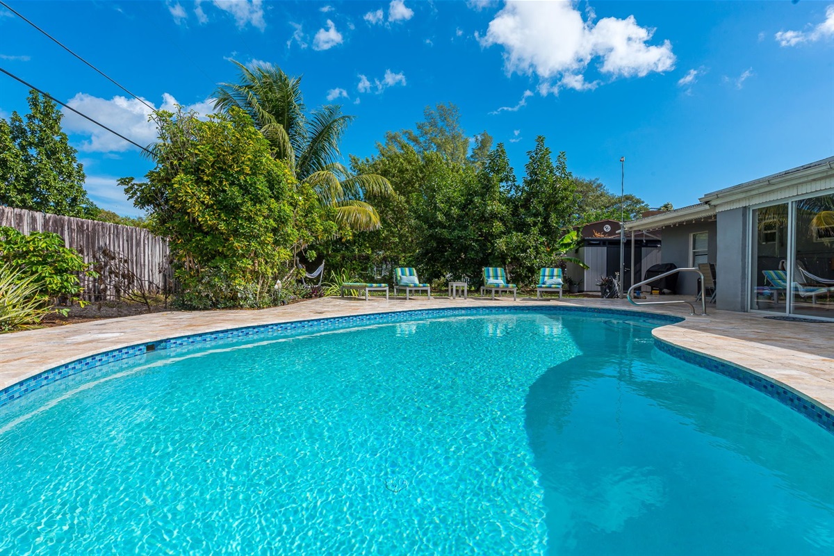 The outside is a highlight, with the heated pool, outdoor sun- loungers, BBQ and covered dining area.