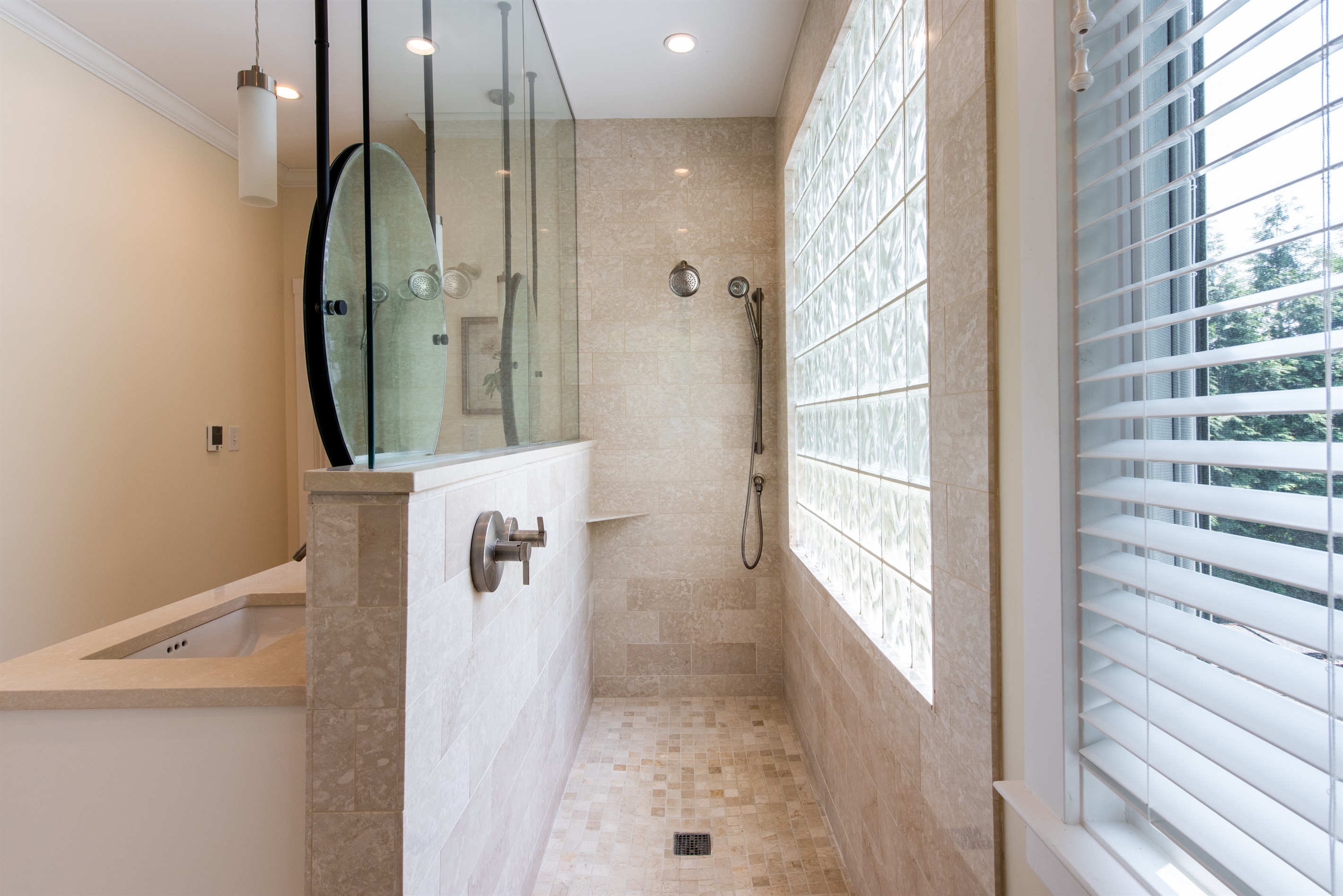 Sleek modern walk-in shower, combining style and functionality for a spa-like experience.